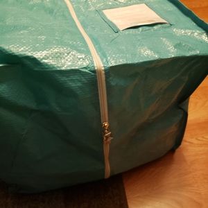 #3 - Garment bag - large. New in package. Never used. Heavy duty material.